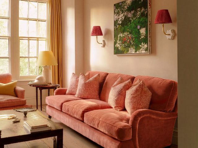 peach sofa with cream walls