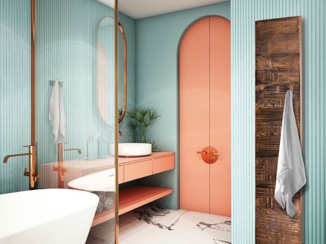 Green and terracotta bathroom by The Radiator Centre