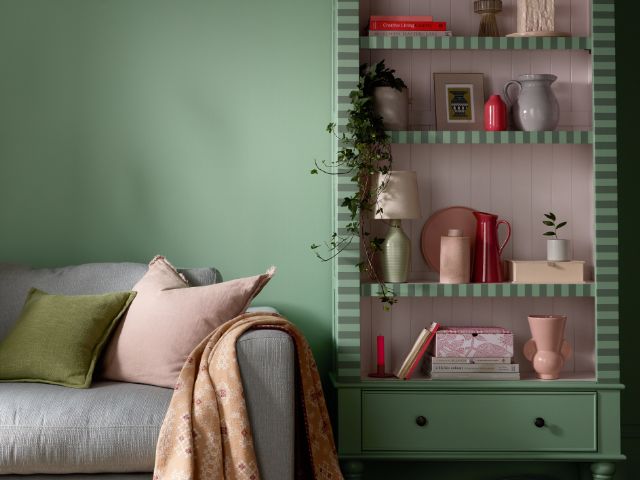 Green shelves in a living room