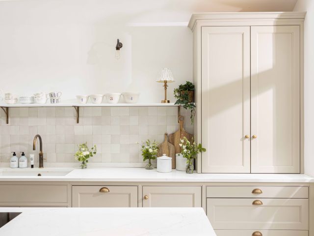 White kitchen with pared back shelves