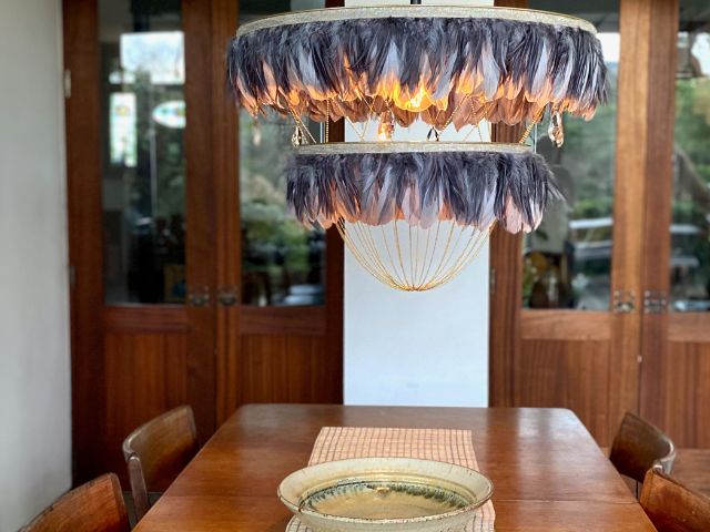 Feather light pendant in a dining room by Coldharbour Lights