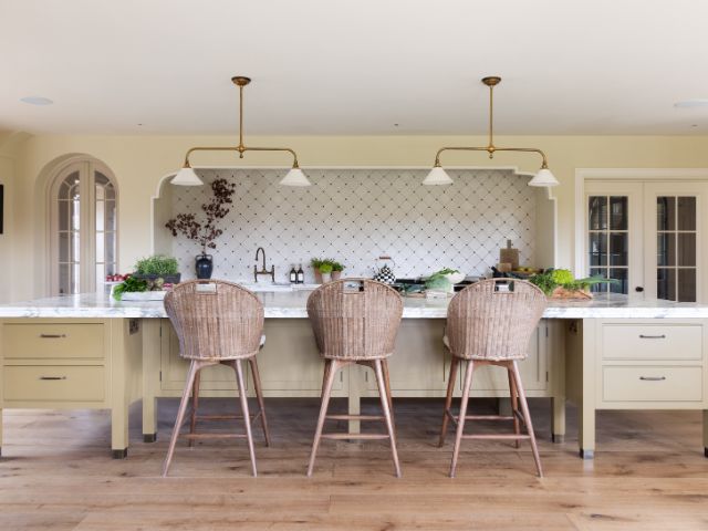 Yellow kitchen with statement island