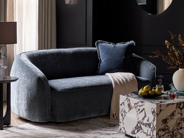 Indigo living room with a denim sofa by Danetti